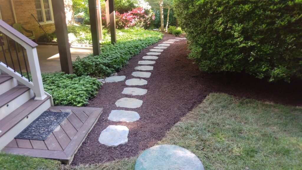 Garden with colorful flowers and a water feature